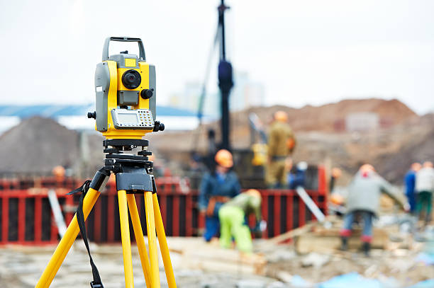 Surveyors setting up a total station